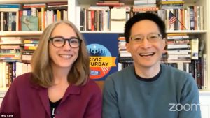 Jena and Eric smiling to the camera while leading Civic Saturday virtually from their home.