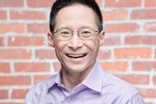Eric Liu smiling.