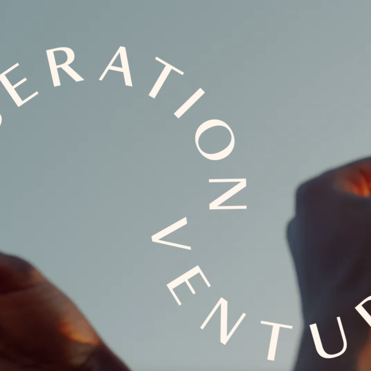 An image of the Liberation Ventures logo with two hands in the background.