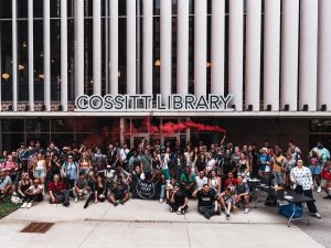 A group standing in front of the Cossitt Library.