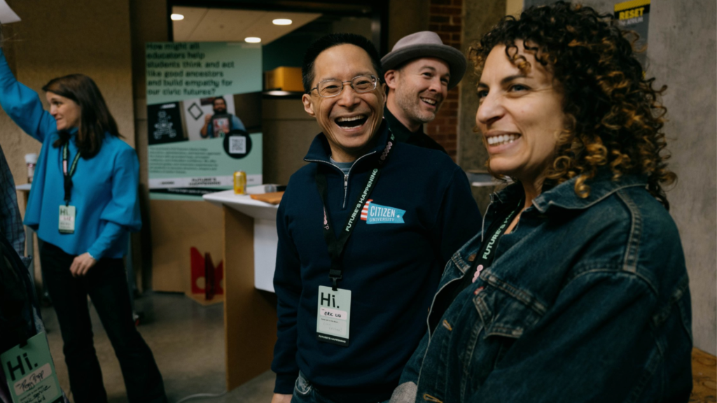 Two people laughing together.